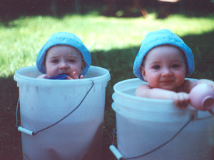 Robert and Penny's twin boys, Chris and Tom Brown in buckets 1988